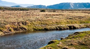 Devil's Gate in the middle distance.  Sweetwater River in the foreground.